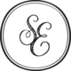 A circular seal with an ornate interlocked S and E monogram in the center